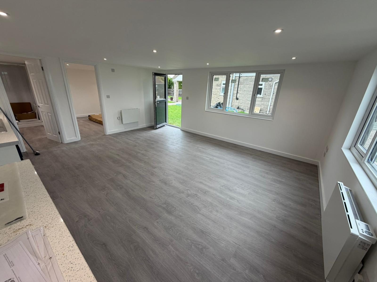 Finished open-plan living space — JLG Construction Services