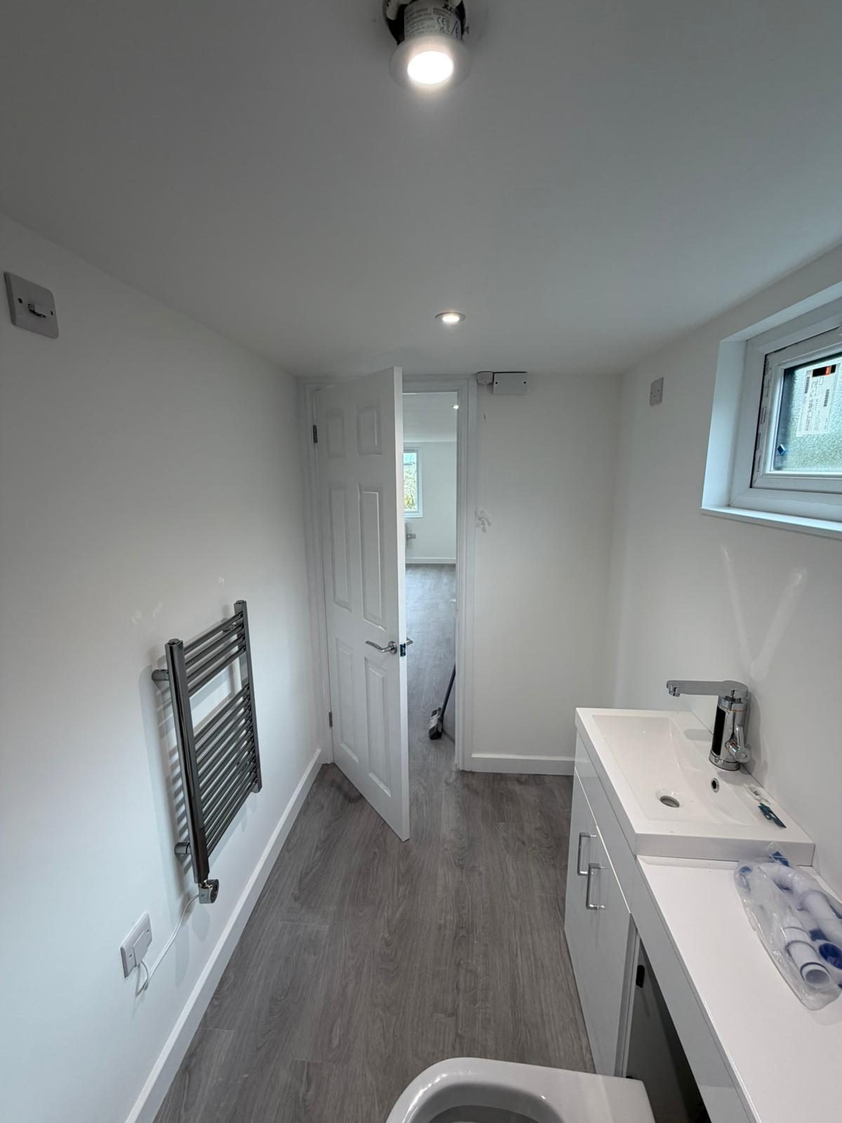 Shower room with heated towel rail — JLG Construction Services