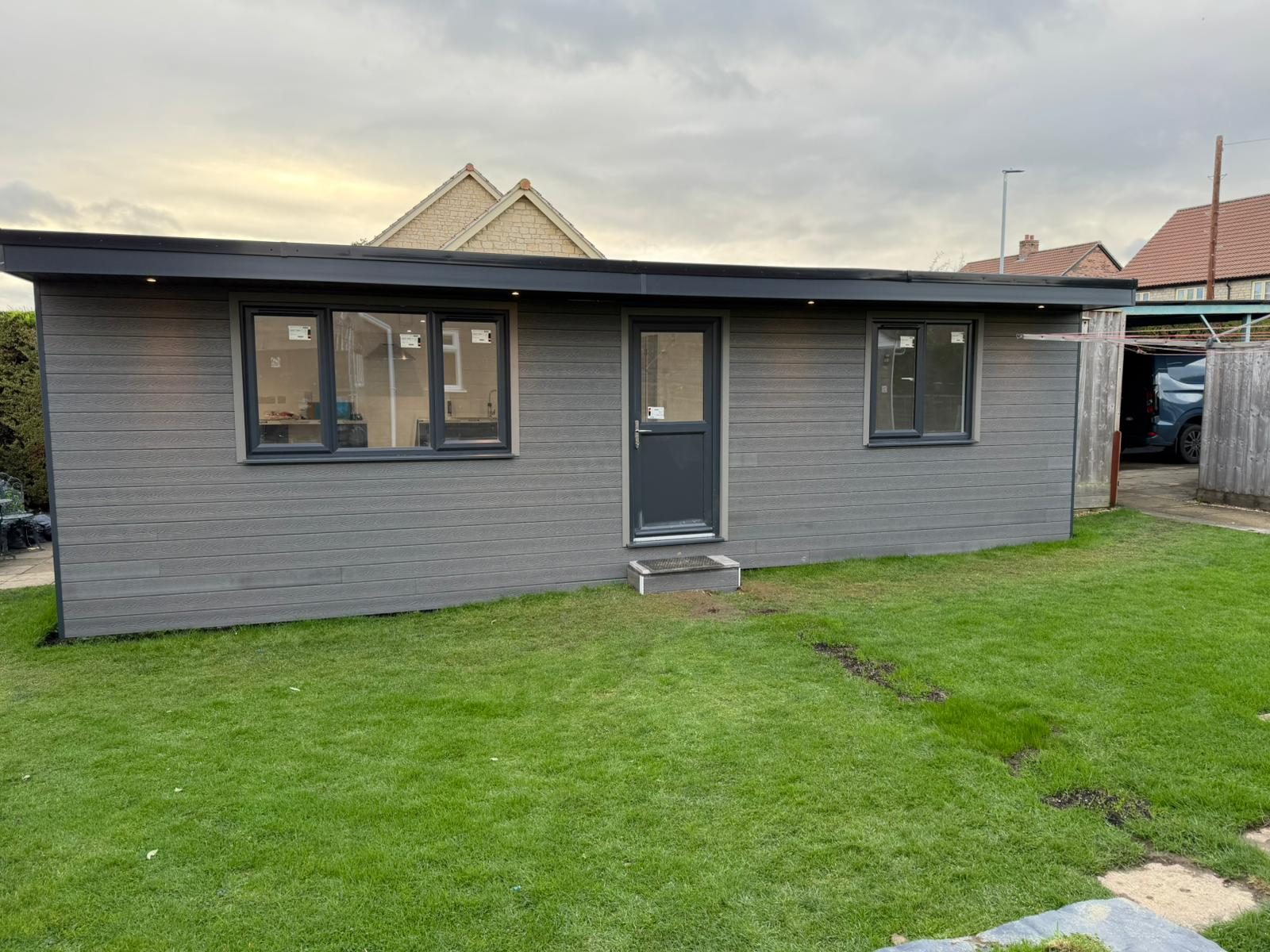 Completed garden room and new lawn — JLG Construction Services