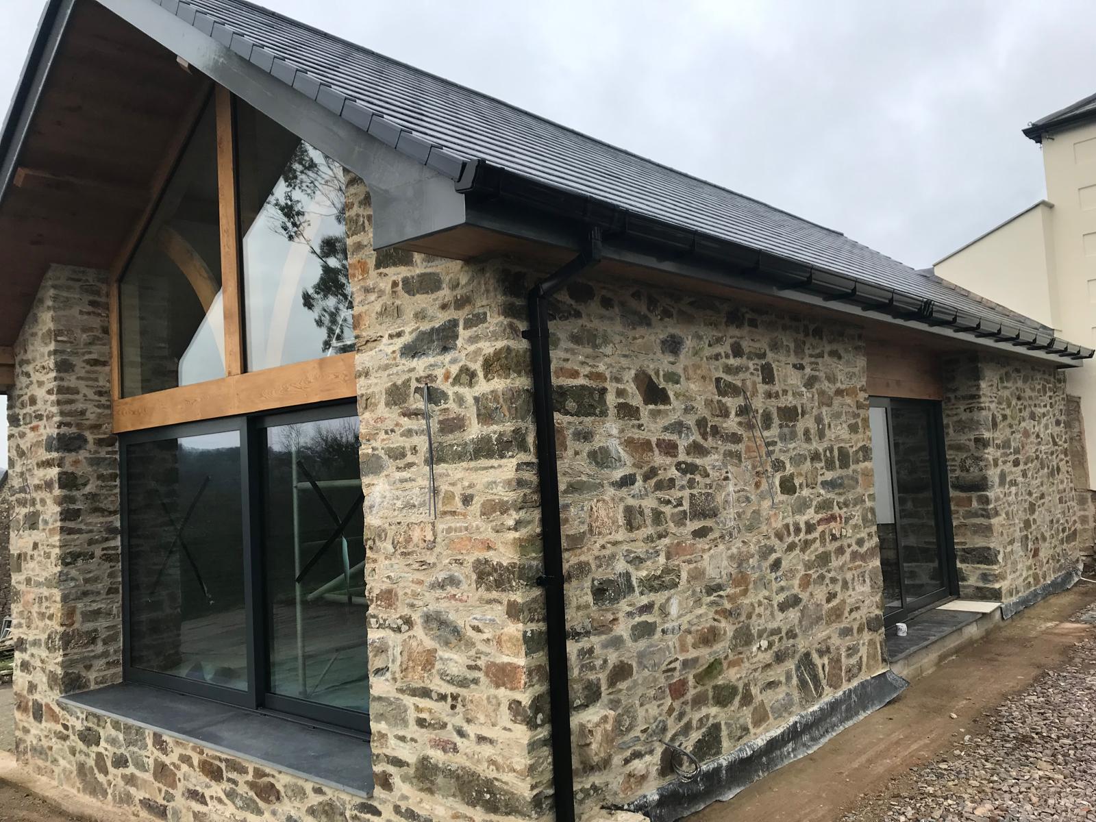 The finished extension, stone, oak and glass under the new roof, Oak-Framed Farmhouse Extension, JLG Construction Services