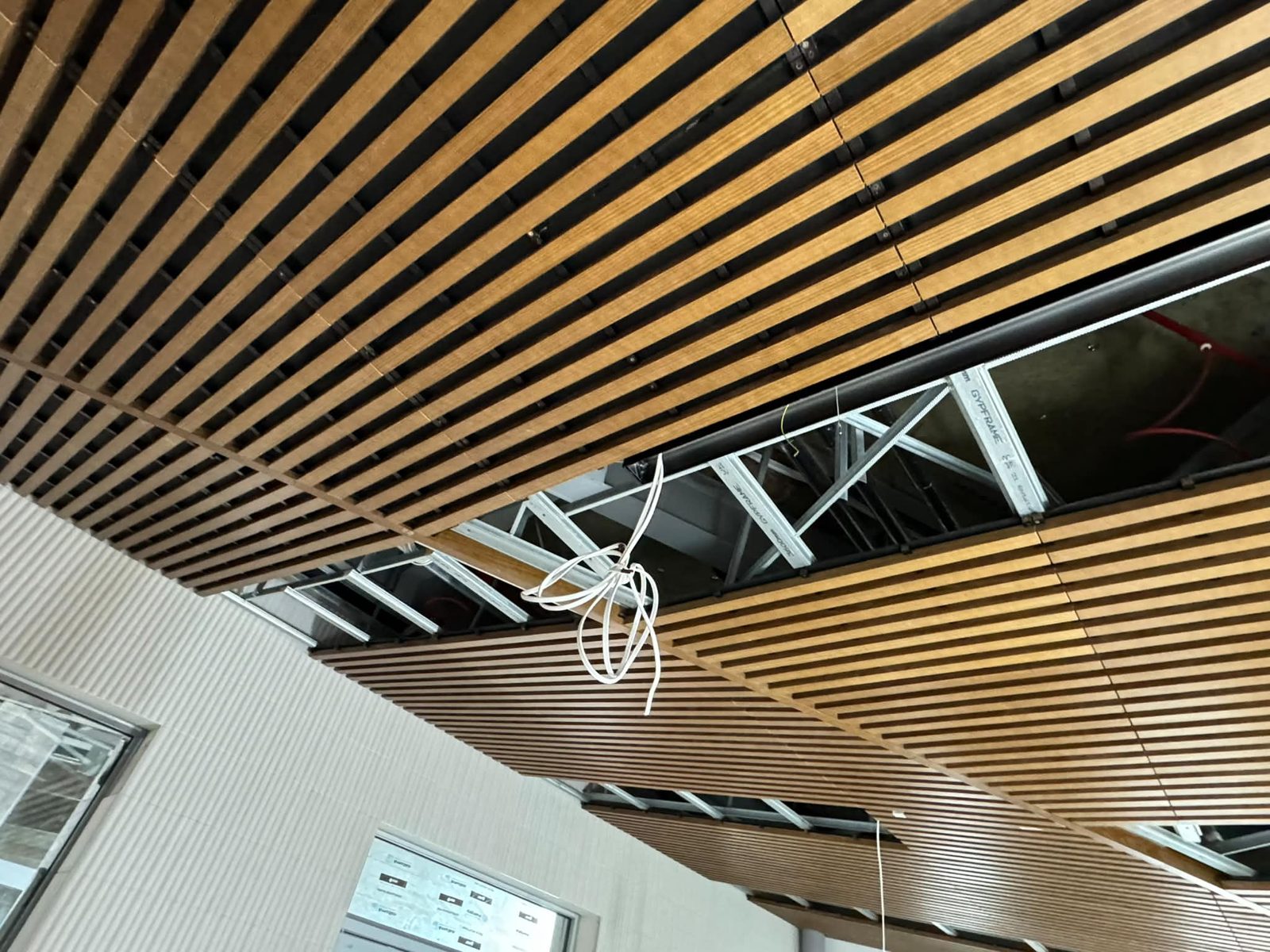 MF ceiling system, mid-install — Plymouth Crematorium, JLG Construction Services