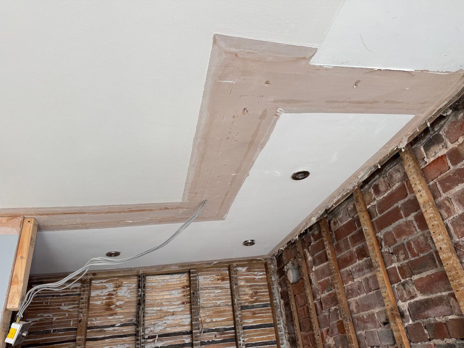 New plasterboard ceiling formed over the original brickwork, JLG Construction Services