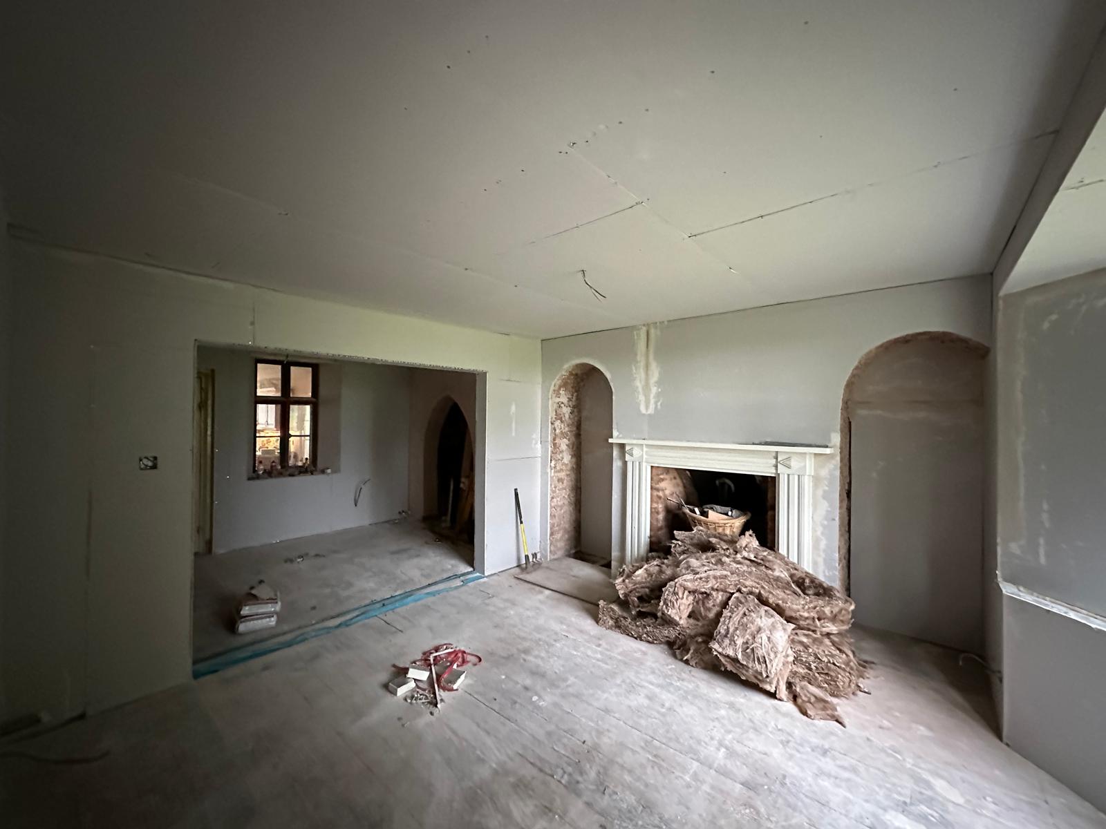 Fireplace and arched alcoves kept and boarded around, Stoodleigh Cottage Renovation, JLG Construction Services