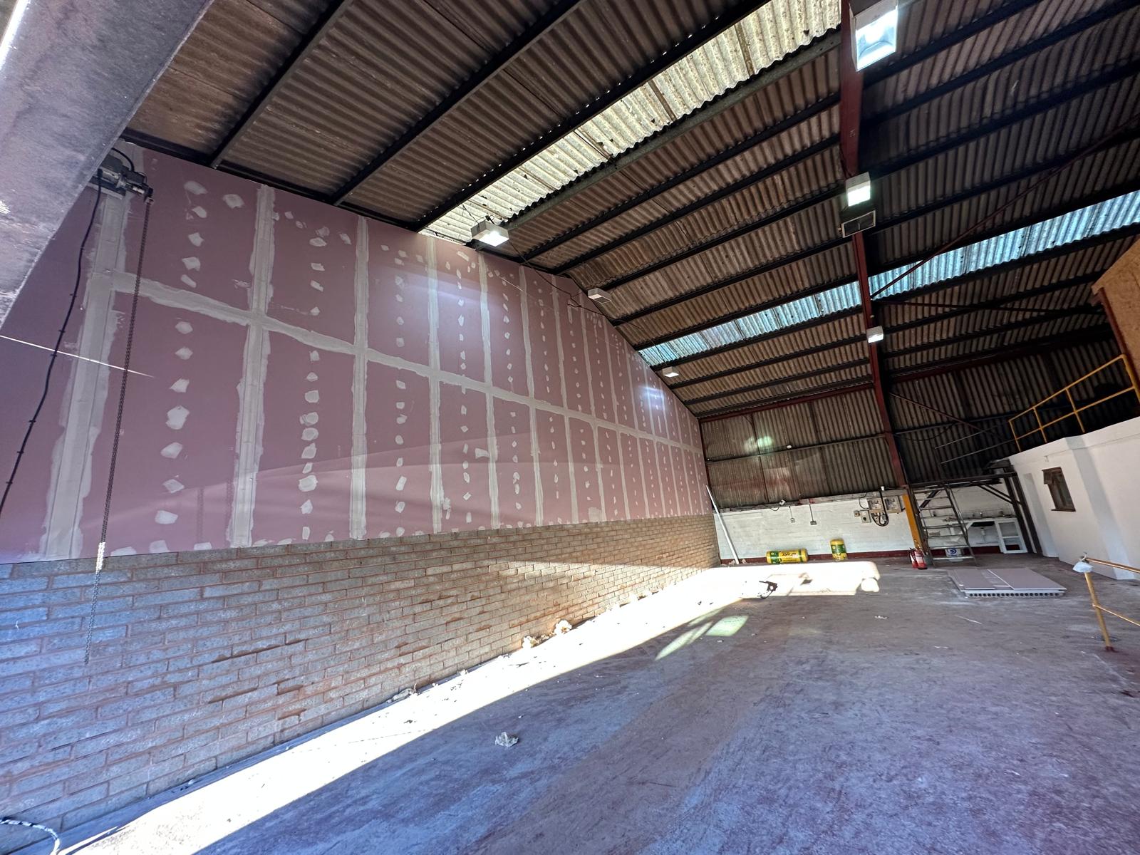 The finished dividing wall, taped and jointed above the blockwork, Wellington Industrial Units, JLG Construction Services